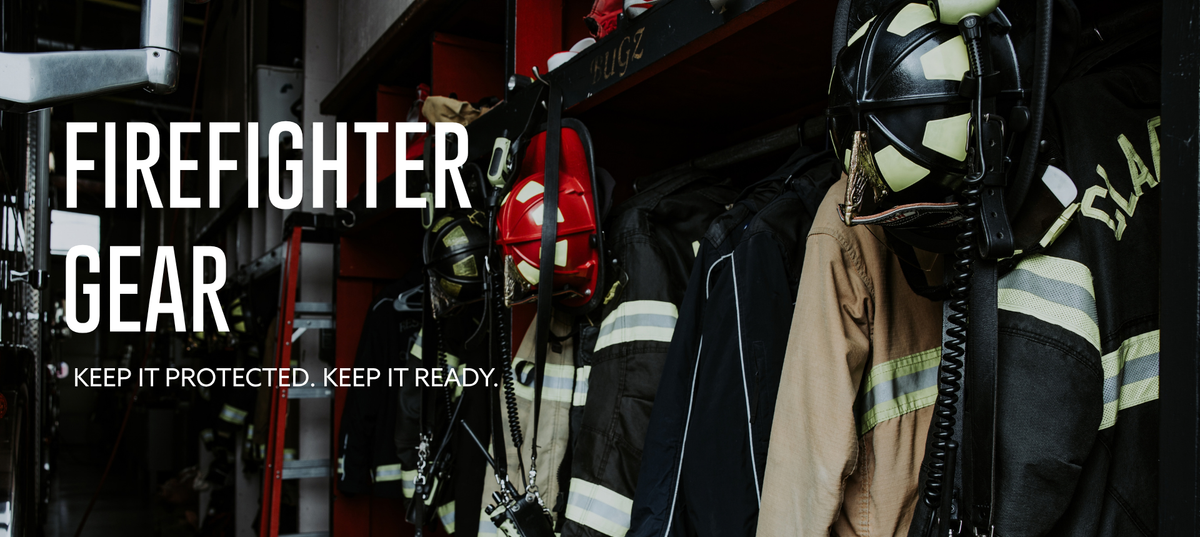 A firefighter gear display featuring various protective items hanging on racks, including a red helmet, black turnout jackets with reflective stripes, a tan jacket, and a black helmet with a communication headset. Large white text on the left reads 'FIREFIGHTER GEAR' with the tagline 'KEEP IT PROTECTED.